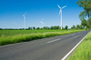 a road and wind farms in the countryside